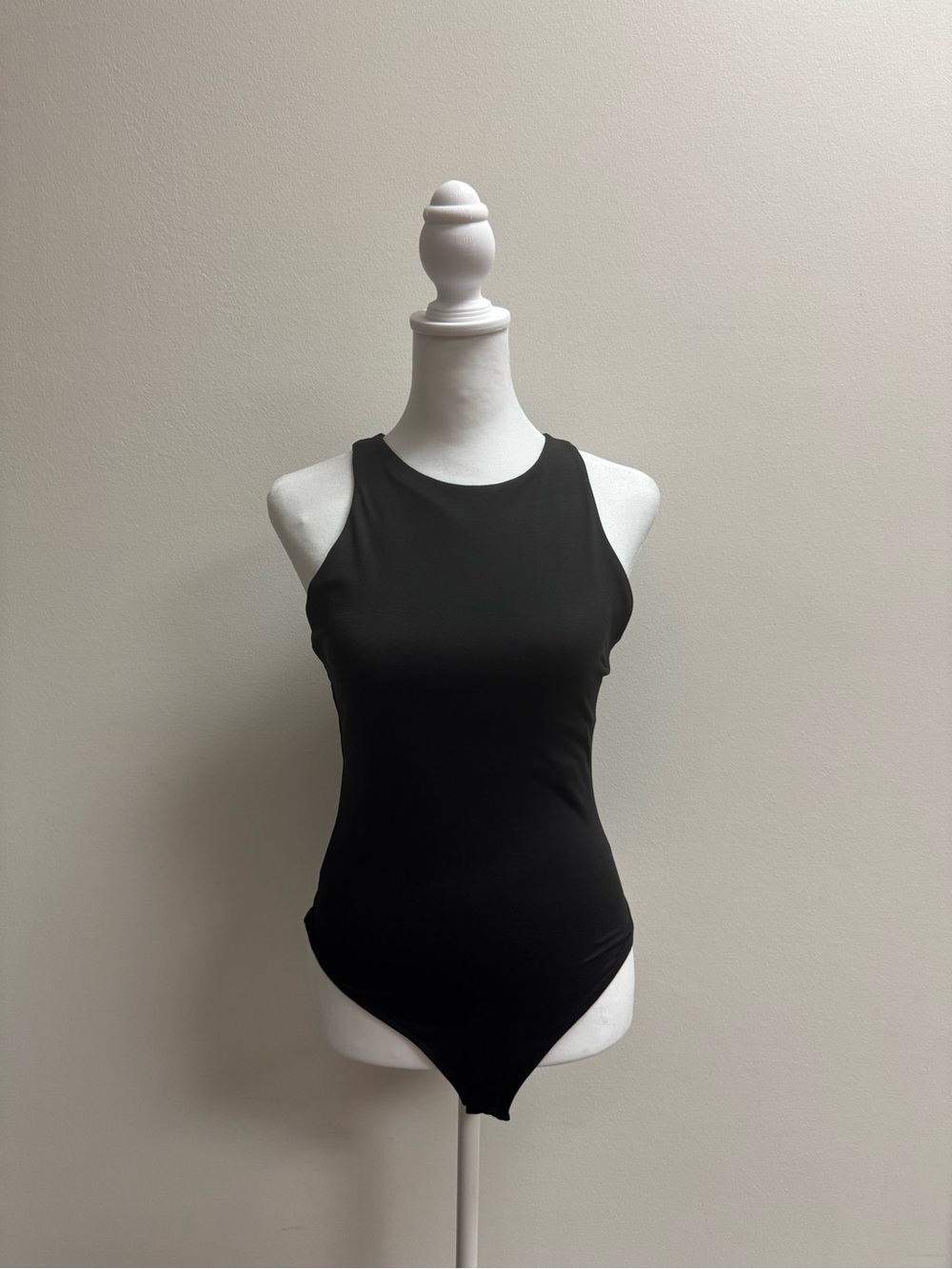 Black Sleeveless High-Neck Bodysuit - Women's Top